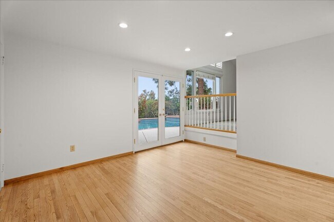 Building Photo - Updated 4-Bedroom with Pool and Bonus Loft...
