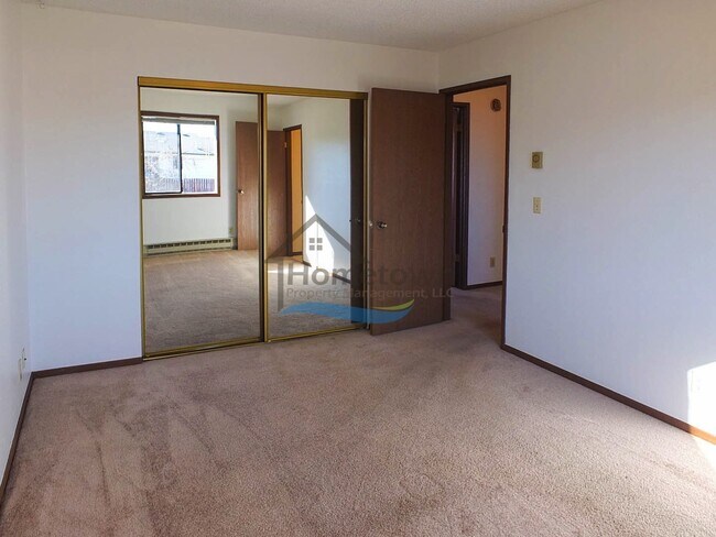Building Photo - Spacious 4 Bedroom Home with Fenced Backyard & Garage