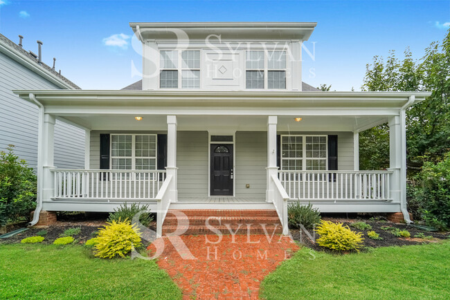 Building Photo - Welcome to this charming abode.
