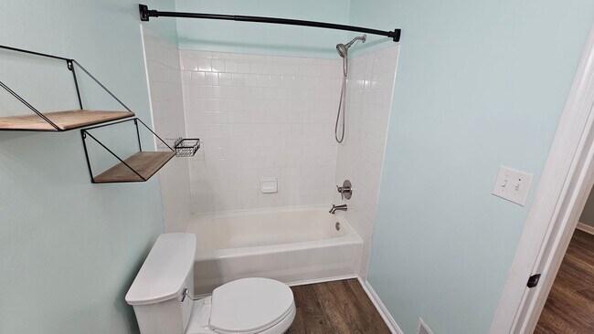 Building Photo - DON'T MISS THIS STUNNER!  3 Bedroom End Unit Townhome in Quiet Location!