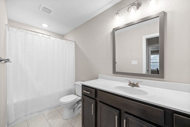 Building Photo - Stocked Pond, Walking Trails and More!!