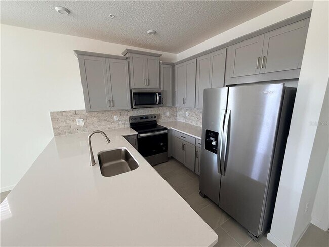 Building Photo - 9948 Red Canoe Aly