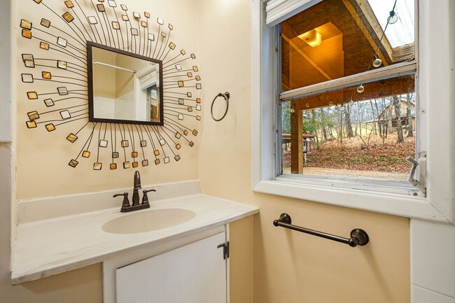 Building Photo - Rural Retreat in Candler with Bonus Room (Heat, Water, & Lawn Maintenance Included)