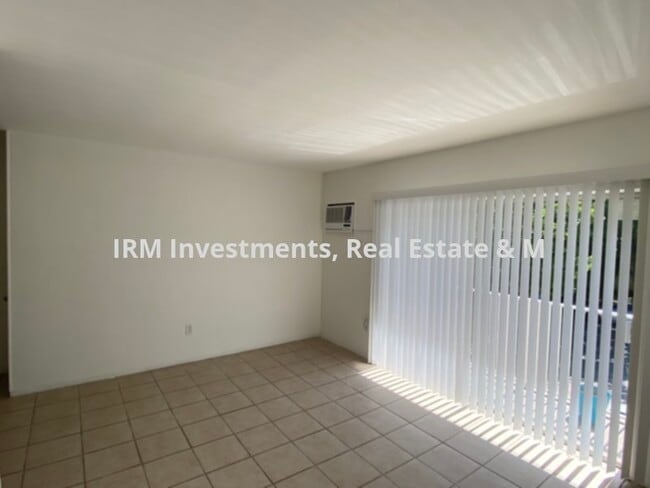 Building Photo - SPACIOUS 1BR/1BA CONDO WITH W&amp;D AND ASSIGNED PARKING