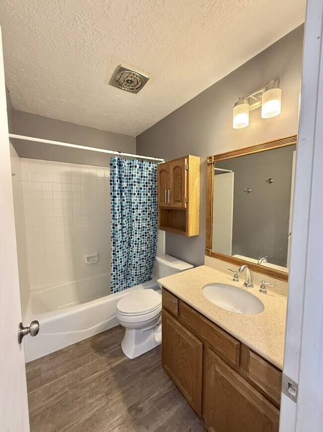 Building Photo - Spacious Comfort Meets Practical Living in...
