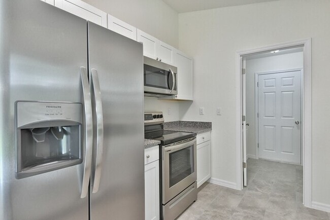 Building Photo - 6136 NW 47 Pl