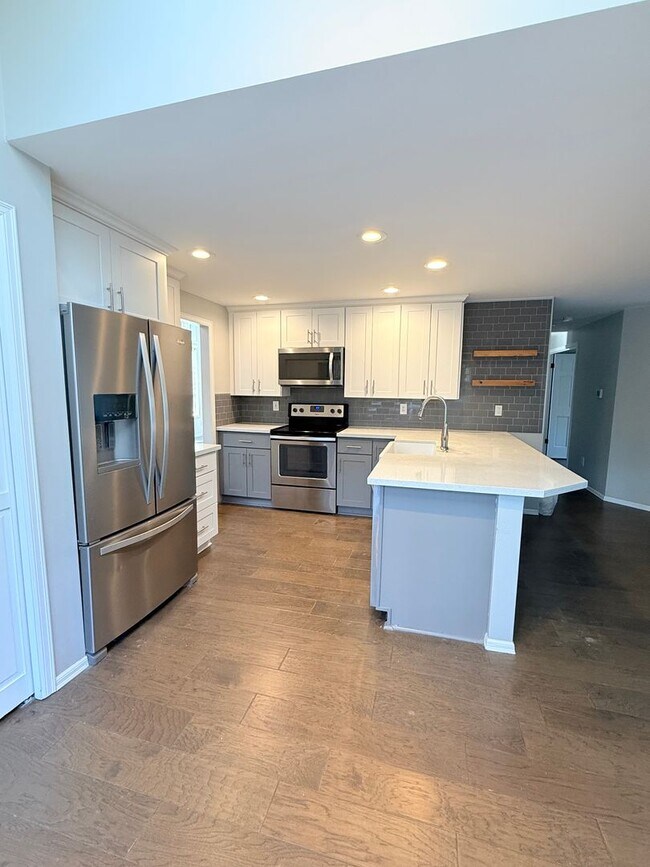 Building Photo - Beautiful 4-Bedroom Home with Expansive Deck & 3-Car Garage – Minutes to Mill Creek Town Center