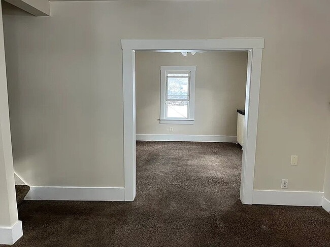 Building Photo - Freshly painted 3/1 in Kenmore...with a detached garage.