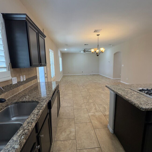 Building Photo - 4 Bedrooms, 3 Baths, a Pool, and Solar Panels!