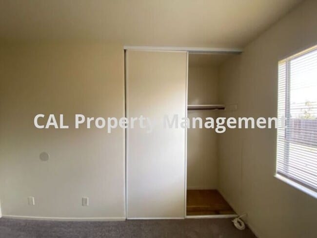 Building Photo - Charming 3-Bedroom, 2-Bathroom Home with Fireplace & Fenced Backyard