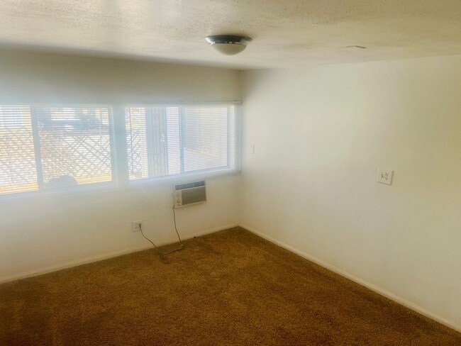 Building Photo - Charming 3-Bedroom Home with Wood Ceilings...