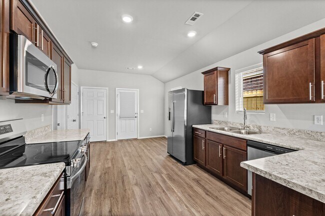 Building Photo - Charming Curb Appeal Meets Modern Comfort in the Monaco Plan!