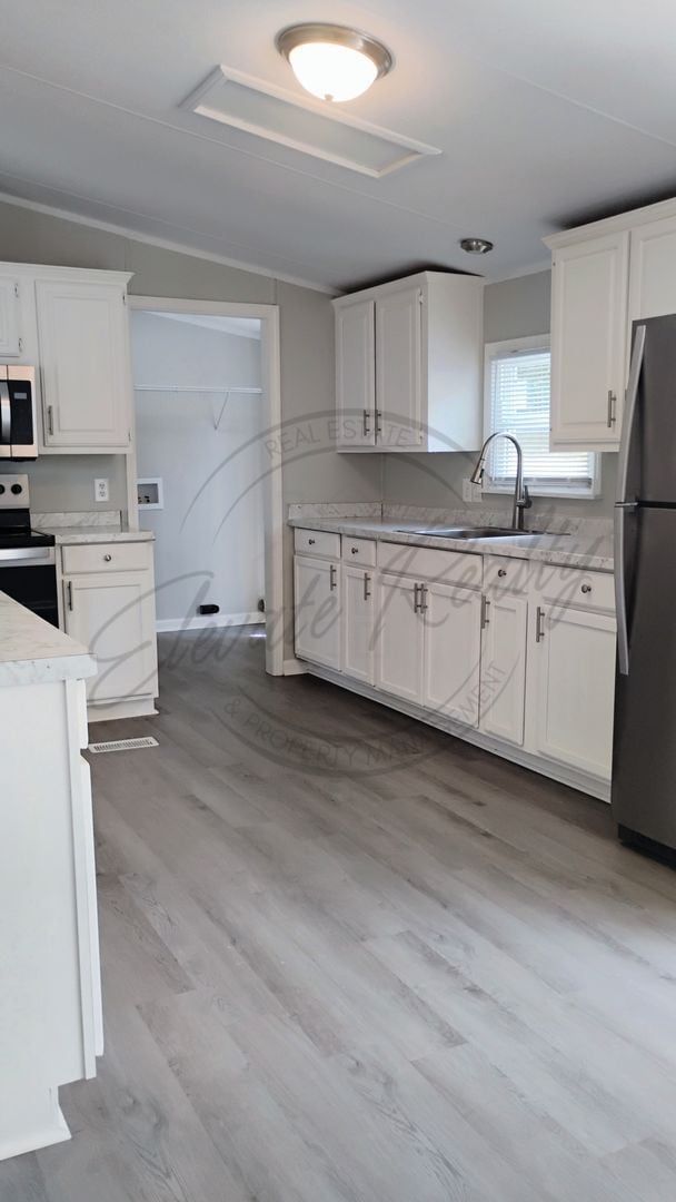Building Photo - ON SPECIAL! THIS PROPERTY HAS A 1/2 OFF TH...