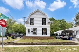 Building Photo - Modern Charm & Fresh Renovation Near River...