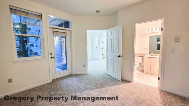 Building Photo - Sunlit & Spacious Ground-Level Condo | 12-Foot Ceilings, Luxury Amenities & Ideal Locale