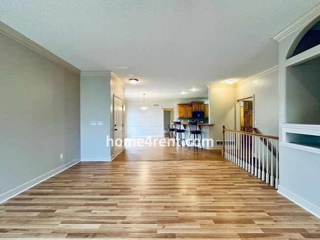 Building Photo - Maintenance Free! Main level Master, Finished Basement and Wood Floors in the Kitchen! *Brand New...