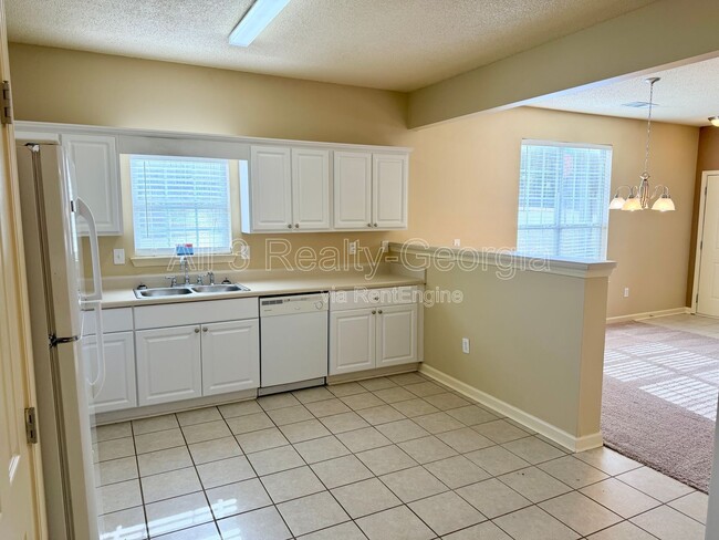 Building Photo - 115 Odyssey Turn NW