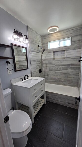 Shared hallway bathroom - 10603 Bramblebush Ave