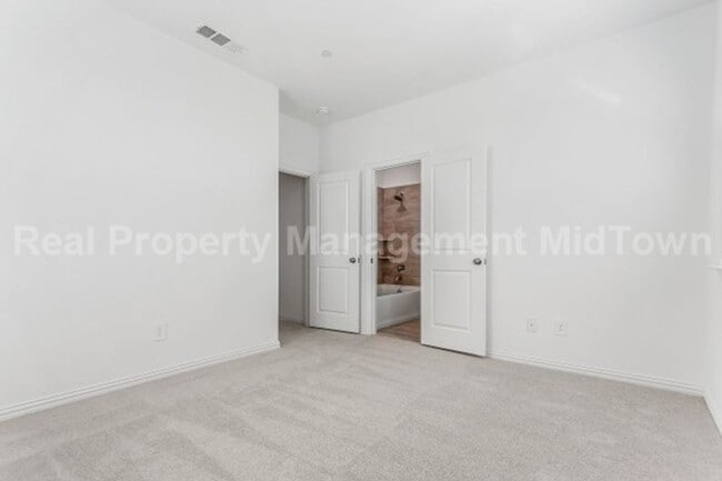 Building Photo - Live Elevated in the Heart of Viridian – S...