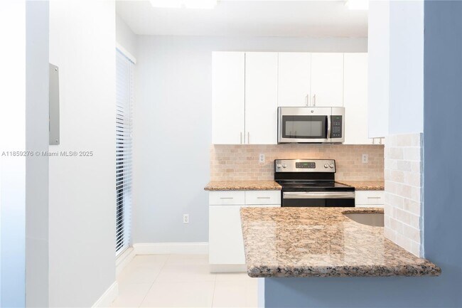 Building Photo - 6061 Collins Ave