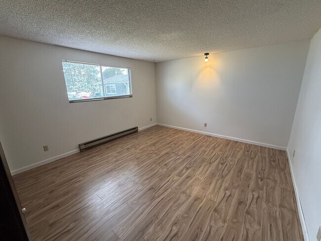 Building Photo - Spacious Single-Level Living with Retro Charm, Private Garage & Abundant Storage