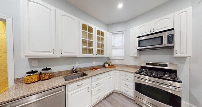 Building Photo - Extraordinary Columbia Heights Opportunity | Spacious 5BR + 2 Den Home with Off-Street Parking