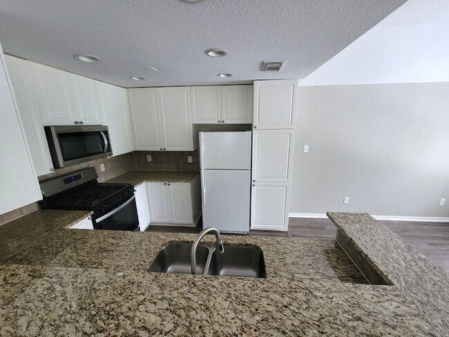 Building Photo - 77 Woodlily Pl