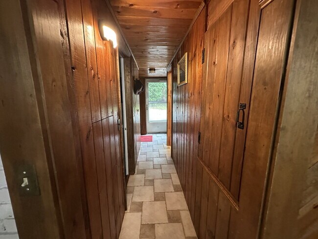 Building Photo - Peaceful Waterfront Living: 2-Story Home on River Road with Ample Outdoor Storage & Water Extras!