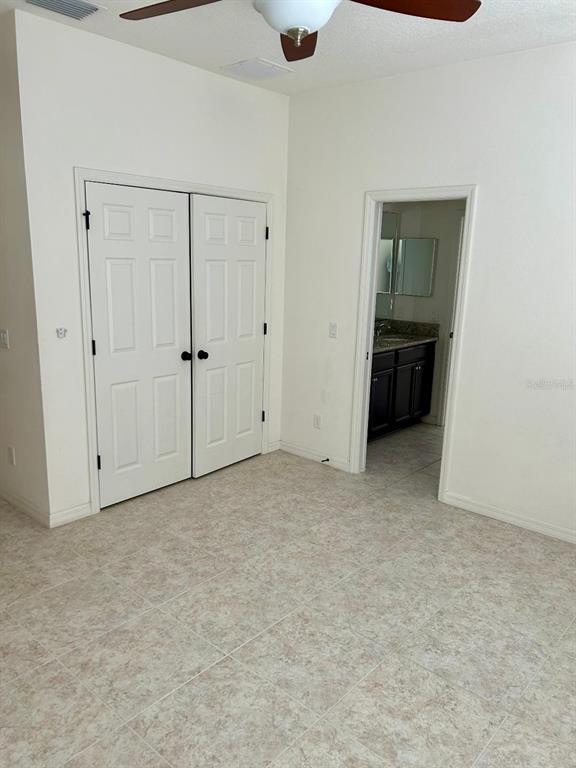 Building Photo - 8818 Tropical Palm Dr