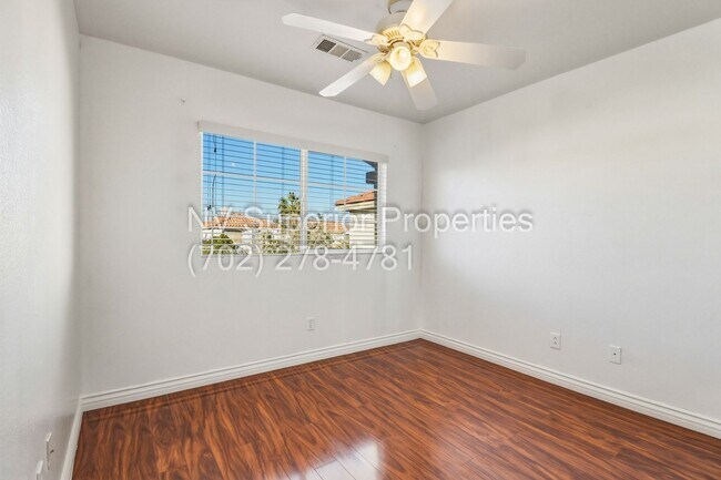 Building Photo - SE!!! 4 Bedrooms!! Master Downstairs!! No Carpet!! Synthetic Grass front and back!!