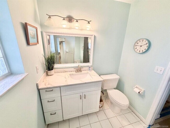 Building Photo - 3486 SW Pindo Palm Ln