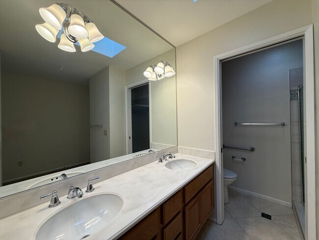 Building Photo - Lovely 2B/2BA Condo in 55+ Community w/Attached Garage & 2 Private Patios!