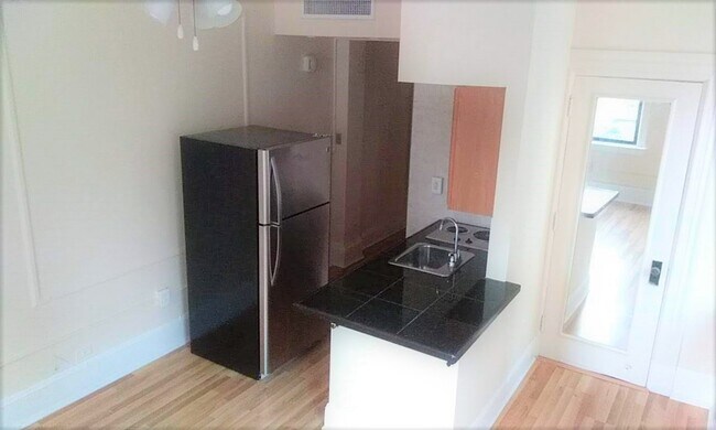 Building Photo - Arts Condominium [1324]