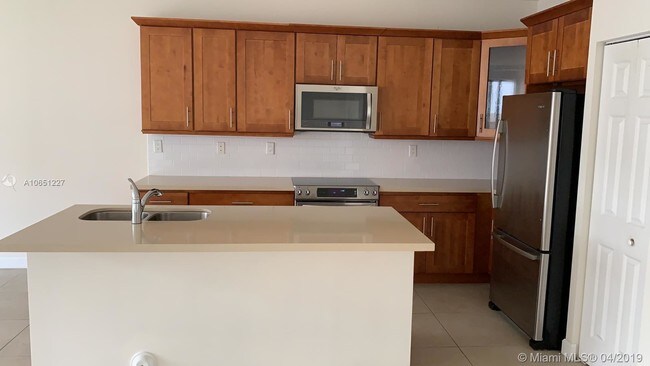 Building Photo - 6175 NW 104th Ct