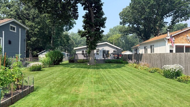 Building Photo - Riverfront Living on the Fox: 2 Bed, 1 Bath with Private Dock and Oversized Garage