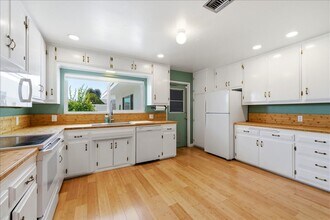 Building Photo - 3 bed / 2 Bath Mid-Century Home with Two-Car Garage, Soaking Pool and Manicured Backyard!