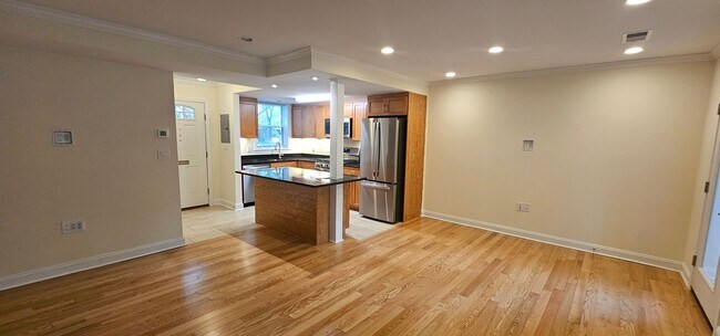 Building Photo - Spacious 2-bedroom townhouse on beautifully landscaped grounds.