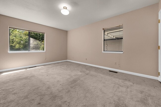 Building Photo - One Story Home with Large Detached Garage too