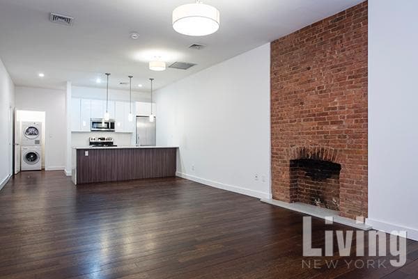 Building Photo - East Village 3 Bdr/2 Bath Duplex with Private Garden & Condo Finishes!