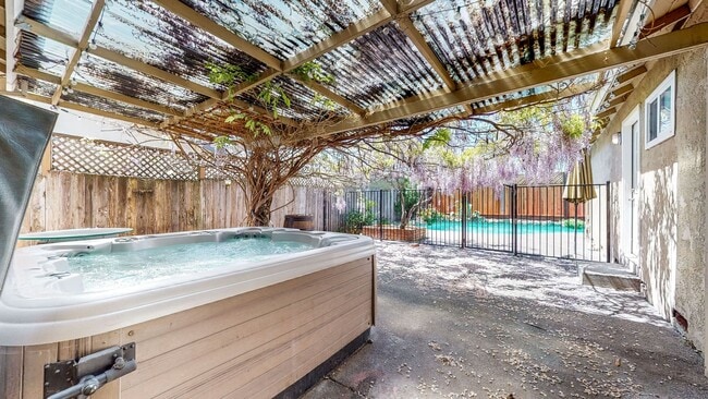 Building Photo - PURE Property Management - Stunning four-b...
