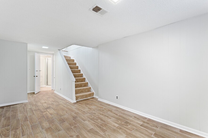 Spacious basement family room w/ tile and fresh paint - 4218 35th St S