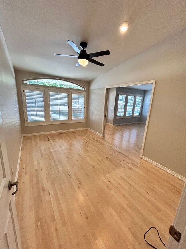 Building Photo - Spacious Duplex with 3-Car Garage & Private Patio!