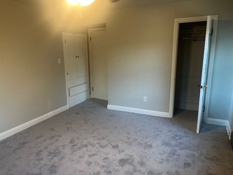 Bed 1 w/built in storage and closet - 635 13th Ave