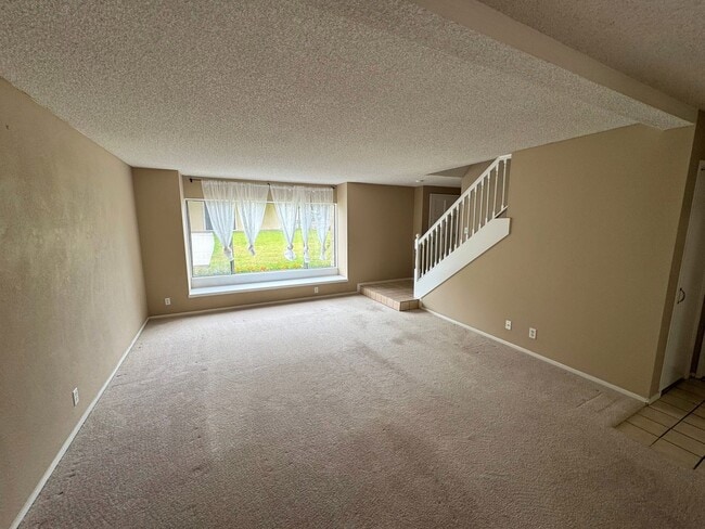 Building Photo - Todd Ranch Townhome- Overlooking The Community Pool!