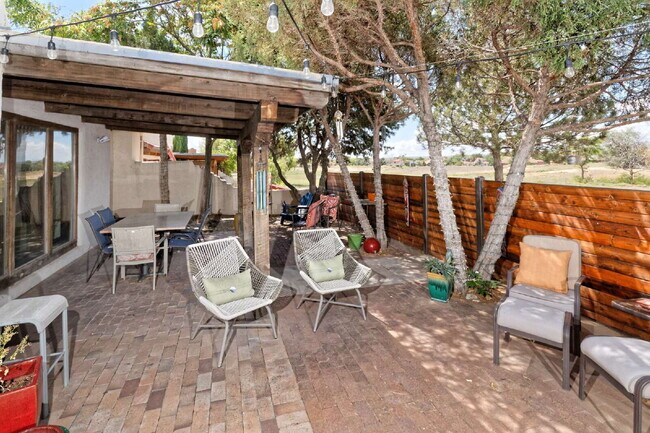 Building Photo - One-of-a-kind adobe brick home backing up to former Club Rio Rancho Golf Course