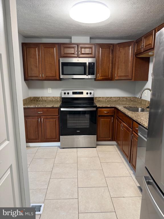 Building Photo - 6554 MacBeth Way