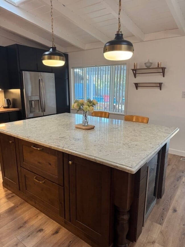 Building Photo - Beautifully Furnished and Recently Painted, Corner Lot Home Features a Fenced Backyard with an In...