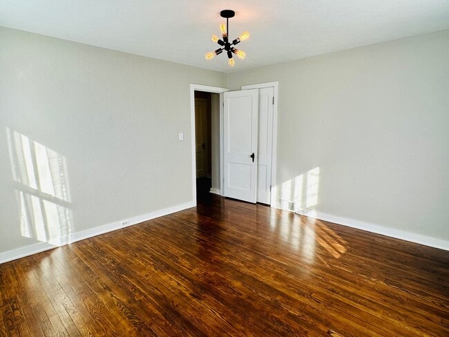 Building Photo - {8520} Charming Four Bedroom in Fantastic Location + Two Main Floor Bedrooms + Hardwood Floors + ...