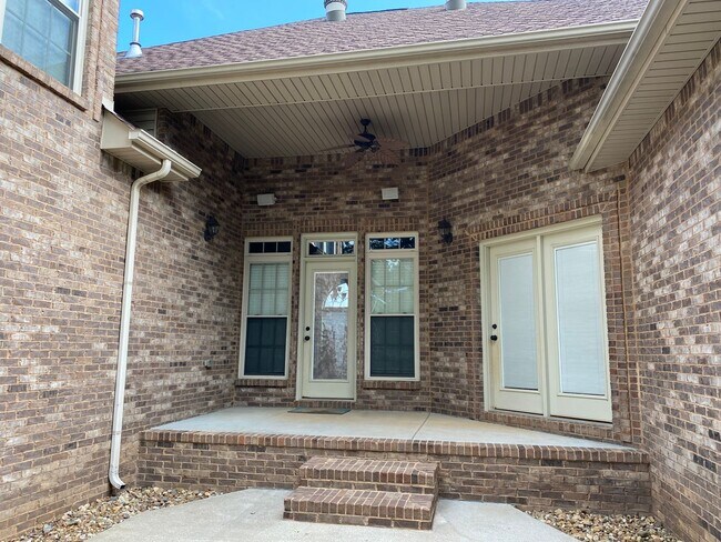 Building Photo - Luxury Living! Beautiful Brick Home in Sango with 3 car garage.