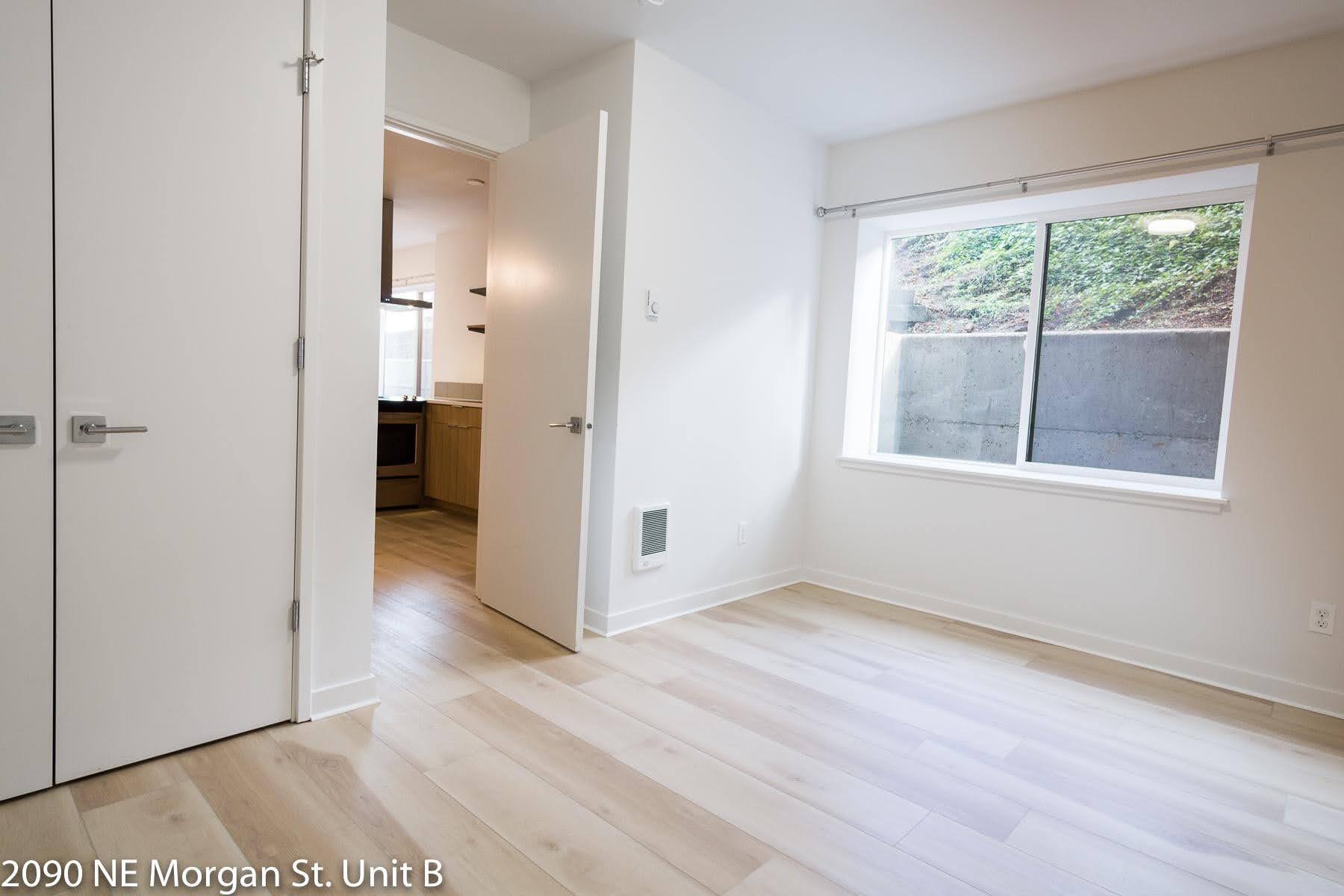 Bedroom with large window and privacy - 2090 NE Morgan St